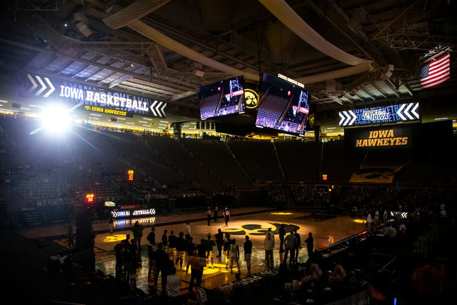 Iowa Hawkeyes players watch introductions before a NCAA Big Ten Conference men's basketball game against Michigan State, Tuesday, Feb. 2, 2021, at Carver-Hawkeye Arena in Iowa City, Iowa.
