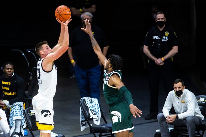 Iowa's Joe Wieskamp (10) makes a 3-point basket during a NCAA Big Ten Conference men's basketball game against Michigan State, Tuesday, Feb. 2, 2021, at Carver-Hawkeye Arena in Iowa City, Iowa.