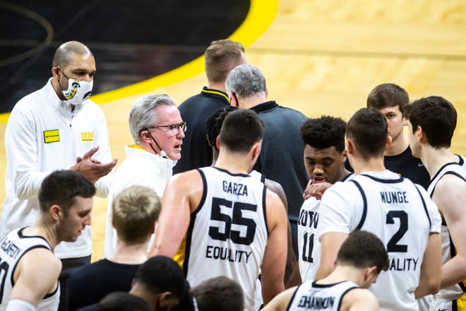 Iowa head coach Fran McCaffery talks to players in a timeout during a NCAA Big Ten Conference men's basketball game against Michigan State, Tuesday, Feb. 2, 2021, at Carver-Hawkeye Arena in Iowa City, Iowa.