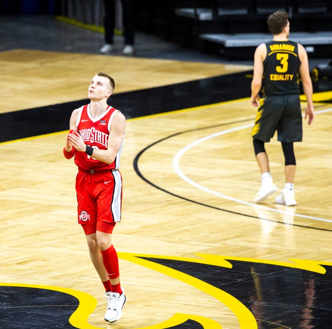 Ohio State forward Justin Ahrens (10) reacts after making a 3-point basket during a NCAA Big Ten Conference men's basketball game, Thursday, Feb. 4, 2021, at Carver-Hawkeye Arena in Iowa City, Iowa.