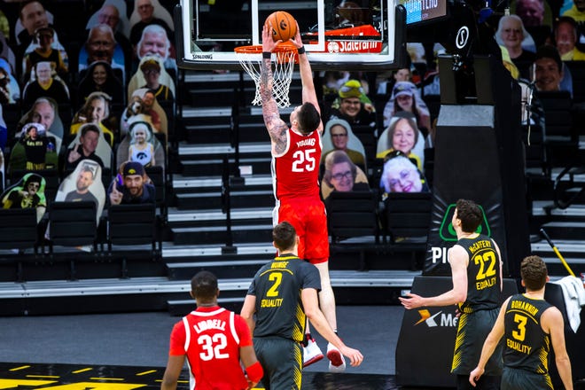 Ohio State forward Kyle Young (25) dunks the ball during a NCAA Big Ten Conference men's basketball game, Thursday, Feb. 4, 2021, at Carver-Hawkeye Arena in Iowa City, Iowa.