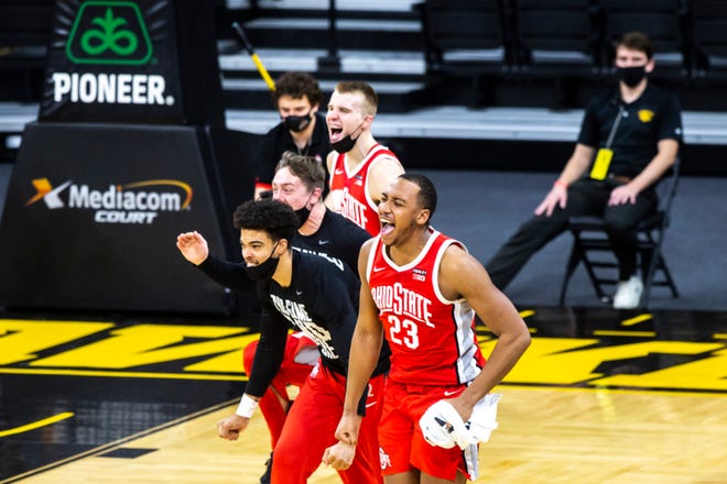 Ohio State forward Zed Key (23) celebrates with teammates after beating the Iowa Hawkeyes 89-85 during a NCAA Big Ten Conference men's basketball game, Thursday, Feb. 4, 2021, at Carver-Hawkeye Arena in Iowa City, Iowa.