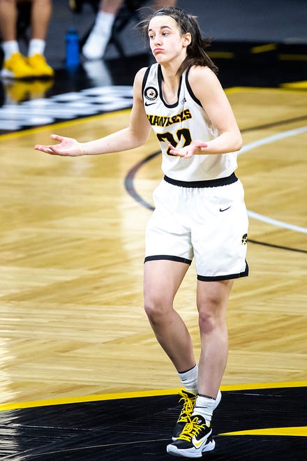 Iowa guard Caitlin Clark (22) reacts after making a 3-point basket during a NCAA Big Ten Conference women's basketball game against Indiana, Sunday, Feb. 7, 2021, at Carver-Hawkeye Arena in Iowa City, Iowa.