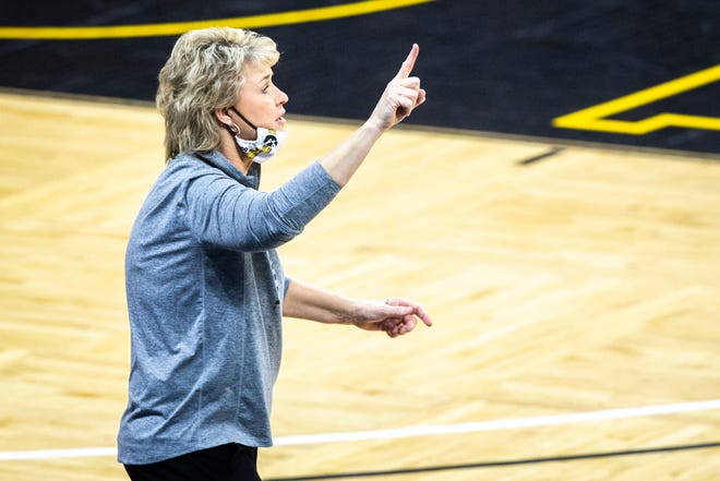 Iowa head coach Lisa Bluder calls out to players during a NCAA Big Ten Conference women's basketball game against Indiana, Sunday, Feb. 7, 2021, at Carver-Hawkeye Arena in Iowa City, Iowa.
