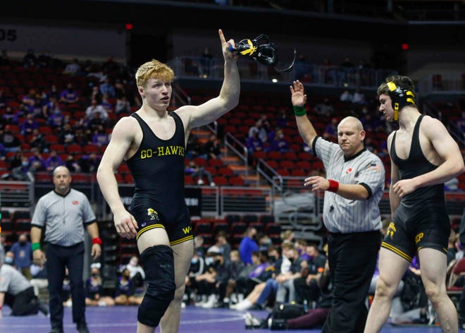 Waverly-Shell Rock's Jake Walker celebrates a win over Southeast Polk's Aiden Grimes in their Class 3A match at 195 pounds during the Iowa high school state dual wrestling tournament on Wednesday, Feb. 17, 2021, at Wells Fargo Arena in Des Moines.