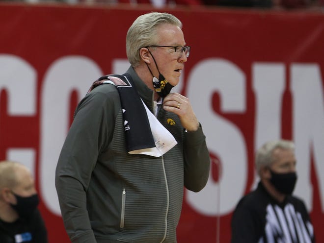 Feb 18, 2021; Madison, Wisconsin, USA; Iowa Hawkeyes head coach Fran McCaffery watches his team in the game against the Wisconsin Badgers during the second half at the Kohl Center. Mandatory Credit: Mary Langenfeld-USA TODAY Sports