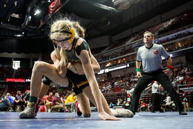 Bettendorf's Ella Schmit wrestles Iowa City, City High's Kael Kurtz during their class 3A 106 pound second round consolation match at the Iowa high school state wrestling tournament on Friday, Feb. 19, 2021, in Des Moines, IA.