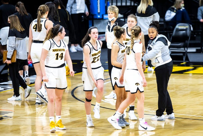 Iowa assistant coach Raina Harmon talks with players during a NCAA Big Ten Conference women's basketball game against Nebraska, Saturday, March 6, 2021, at Carver-Hawkeye Arena in Iowa City, Iowa.