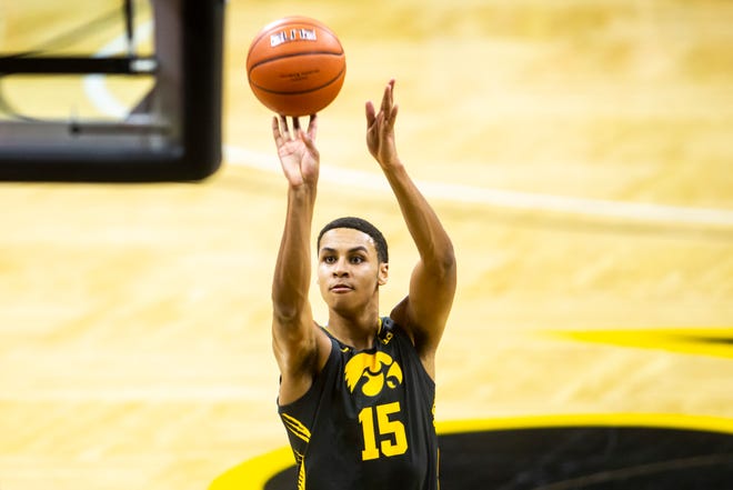 Iowa forward Keegan Murray (15) makes a free throw during a NCAA Big Ten Conference men's basketball game against Wisconsin, Sunday, March 7, 2021, at Carver-Hawkeye Arena in Iowa City, Iowa.