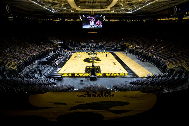 The stands are empty with the exception of family members  during a NCAA Big Ten Conference women's basketball game against Nebraska on senior day, Saturday, March 6, 2021, at Carver-Hawkeye Arena in Iowa City, Iowa.