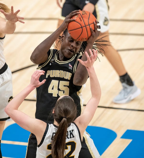Purdue Boilermakers center Fatou Diagne (45) grabs a rebound on Wednesday, March 10, 2021, during the women's Big Ten basketball tournament from Bankers Life Fieldhouse in Indianapolis.