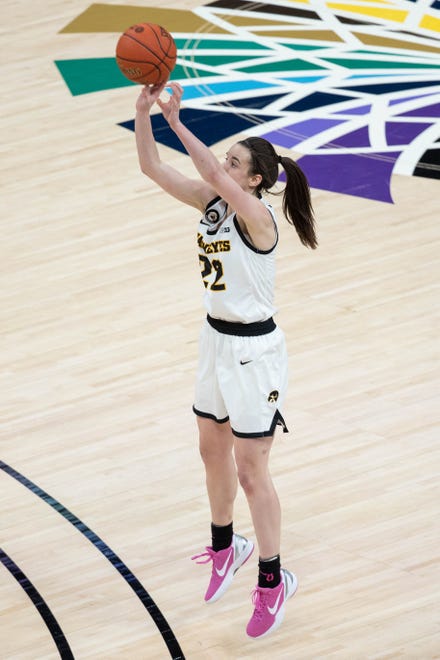 Mar 12, 2021; Indianapolis, IN, USA; Iowa Hawkeyes guard Caitlin Clark (22) shoots the ball in the fourth quarter against the Michigan State Spartans at Bankers Life Fieldhouse. Mandatory Credit: Trevor Ruszkowski-USA TODAY Sports