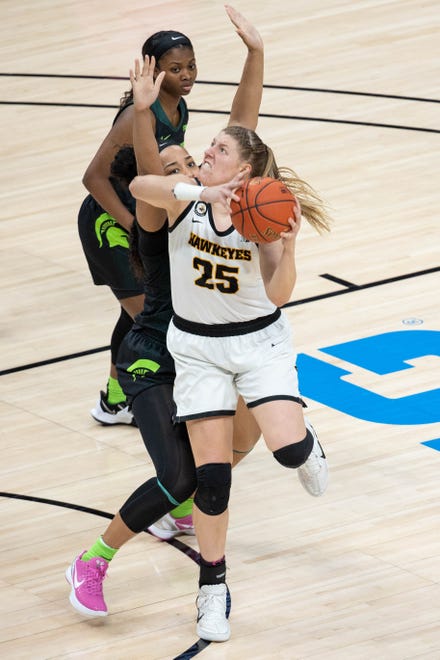 Mar 12, 2021; Indianapolis, IN, USA; Iowa Hawkeyes forward Monika Czinano (25) shoots the ball in the third quarter against the Michigan State Spartans at Bankers Life Fieldhouse. Mandatory Credit: Trevor Ruszkowski-USA TODAY Sports