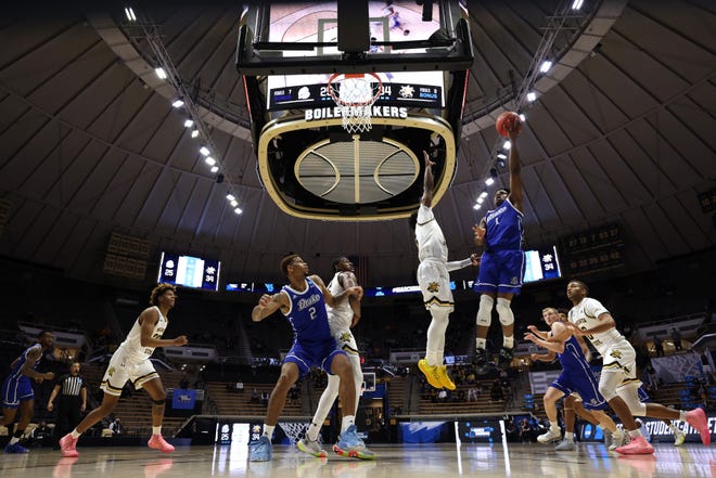WEST LAFAYETTE, INDIANA - MARCH 18: Joseph Yesufu #1 of the Drake Bulldogs attempts a shot against the Wichita State Shockers during the second half in the First Four game prior to the NCAA Men's Basketball Tournament at Mackey Arena on March 18, 2021 in West Lafayette, Indiana.