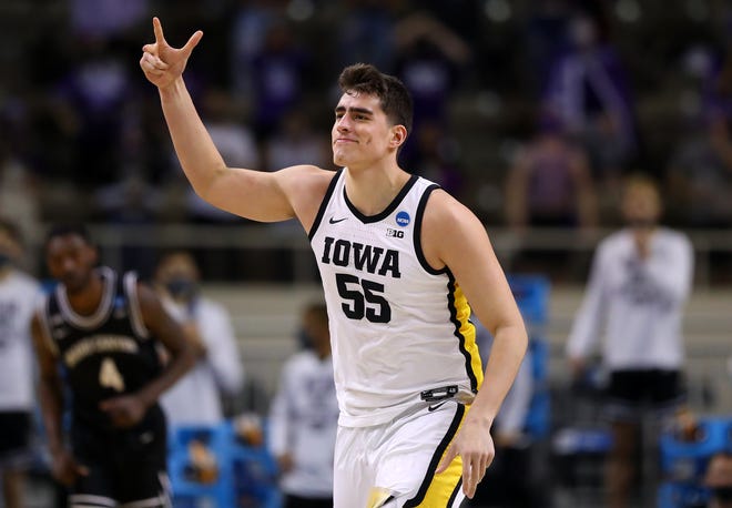 INDIANAPOLIS, INDIANA - MARCH 20: Luka Garza #55 of the Iowa Hawkeyes reacts during the first half against the Grand Canyon Antelopes in the first round game of the 2021 NCAA Men's Basketball Tournament at Indiana Farmers Coliseum on March 20, 2021 in Indianapolis, Indiana.