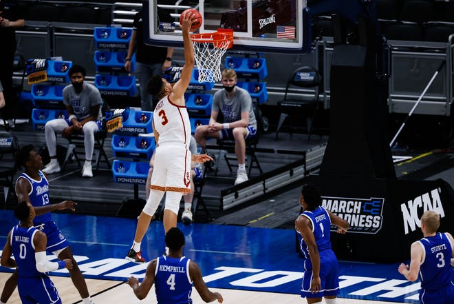 USC forward Isaiah Mobley (3) attempts to dunk the ball during their game against Drake in the first round of the 2021 NCAA Tournament on Saturday, March 20, 2021, at Bankers Life Fieldhouse in Indianapolis, Ind.