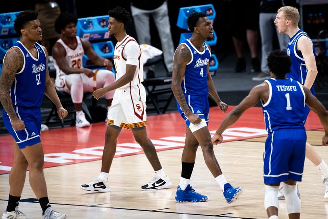 Drake forward ShanQuan Hemphill (4) reacts to scoring while being fouled during their game against USC in the first round of the 2021 NCAA Tournament on Saturday, March 20, 2021, at Bankers Life Fieldhouse in Indianapolis, Ind.
