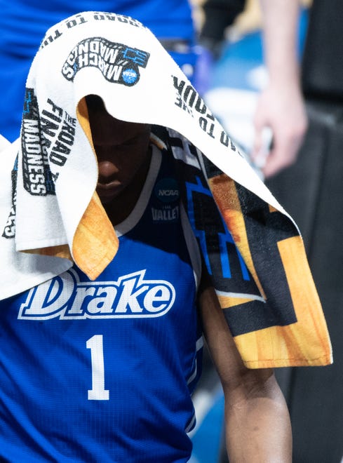 Drake guard Joseph Yesufu (1) walks off the court of his team's 72-56 loss against USC during the first round of the 2021 NCAA Tournament on Saturday, March 20, 2021, at Bankers Life Fieldhouse in Indianapolis, Ind.