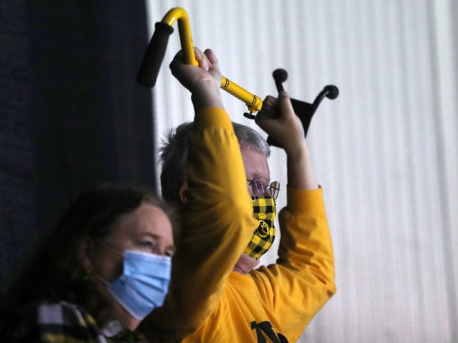 Iowa fans celebrate their 86-74 win over the Grand Canyon Antelopes during the first round of the 2021 NCAA Tournament on Saturday, March 20, 2021, at Indiana Farmers Coliseum in Indianapolis, Ind. Mandatory Credit: Matt Stone/IndyStar via USA TODAY Sports
