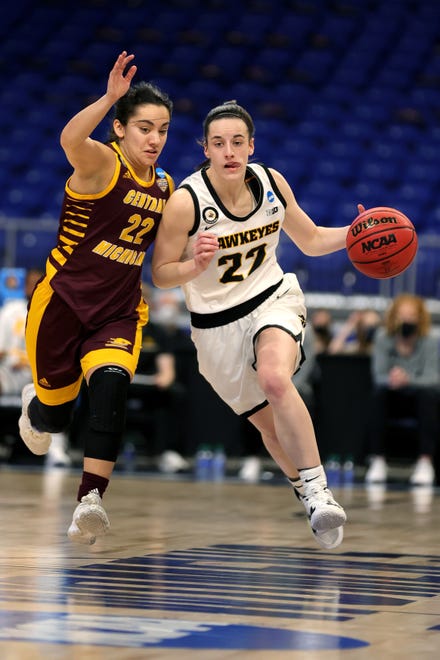 Iowa's Caitlin Clark drives against Central Michigan's Kalle Martinez during the first half of the 2021 NCAA Women's Basketball Tournament at the Alamodome on March 21, 2021 in San Antonio.
