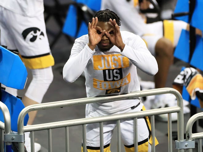 Iowa guard Joe Toussaint reacts during their 86-74 win over the Grand Canyon Antelopes during the first round of the 2021 NCAA Tournament on Saturday, March 20, 2021, at Indiana Farmers Coliseum in Indianapolis, Ind.