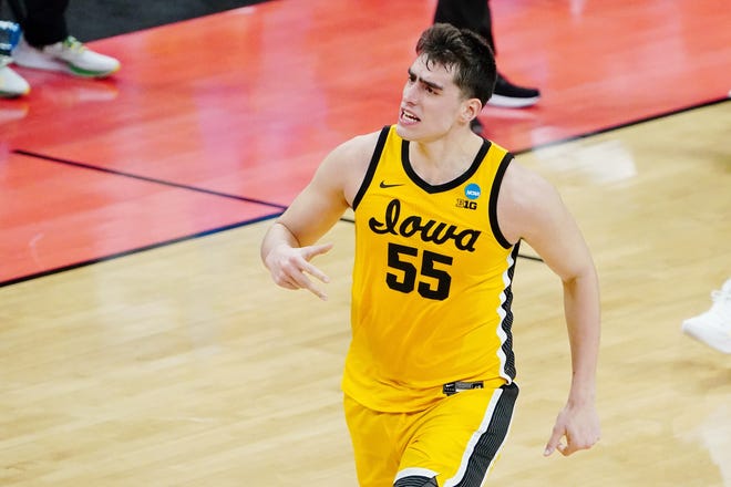 Iowa Hawkeyes center Luka Garza (55) reacts after a play against the Oregon Ducks during the first half in the second round of the 2021 NCAA Tournament March 22, 2021 at Bankers Life Fieldhouse.