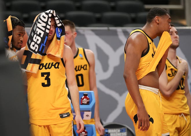 INDIANAPOLIS, INDIANA - MARCH 22: Jordan Bohannon #3 of the Iowa Hawkeyes reacts to losing to the Oregon Ducks in the second round game of the 2021 NCAA Men's Basketball Tournament at Bankers Life Fieldhouse on March 22, 2021 in Indianapolis, Indiana.