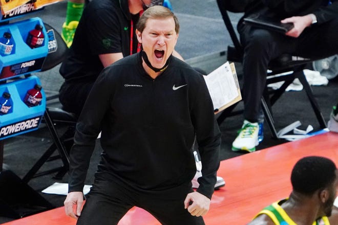 Mar 22, 2021; Indianapolis, Indiana, USA; Oregon Ducks head coach Dana Altman reacts after a play against the Iowa Hawkeyesi during the first half in the second round of the 2021 NCAA Tournament at Bankers Life Fieldhouse.