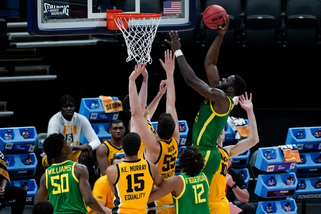 Oregon forward Eugene Omoruyi (2) shoots against Iowa during the first half of a men's college basketball game in the second round of the NCAA tournament at Bankers Life Fieldhouse in Indianapolis, Monday, March 22, 2021.