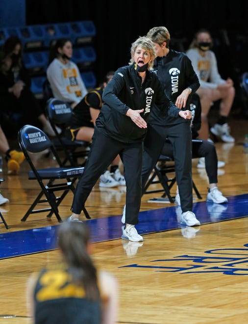 Iowa head coach Lisa Bluder gives instruction to Iowa guard Caitlin Clark (22), during the second half of a college basketball game in the second round of the women's NCAA tournament at the Greehey Arena in San Antonio, Texas, Tuesday, March 23, 2021. Iowa defeated Kentucky 86-72.