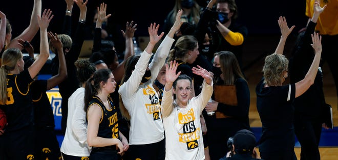 Iowa guard Caitlin Clark (22) and the rest of the team acknowledge the fans at the end a college basketball game against Kentucky  in the second round of the women's NCAA tournament at the Greehey Arena in San Antonio, Tuesday, March 23, 2021. Iowa defeated Kentucky 86-72.