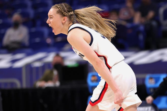 UConn's Paige Bueckers reacts against the Iowa Hawkeyes during the second half in the Sweet 16 round of the NCAA Women's Basketball Tournament at the Alamodome on March 27, 2021 in San Antonio, Texas.
