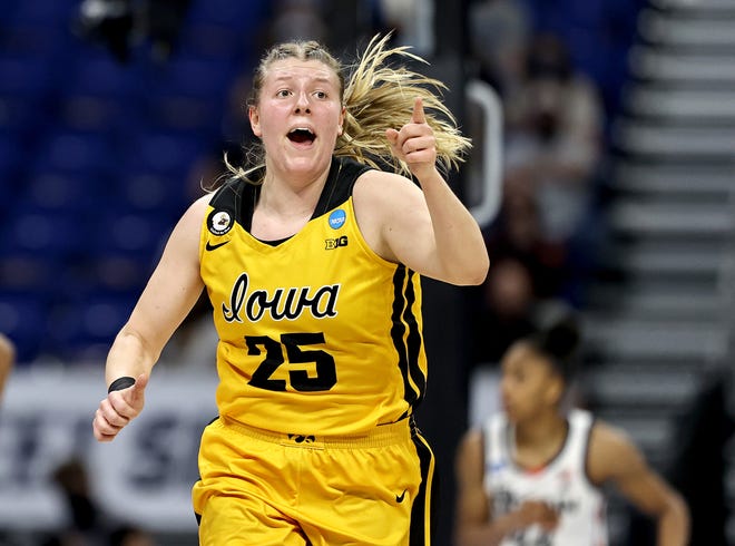 Iowa's Monika Czinano celebrates her shot in the first half against the UConn Huskies during the Sweet 16 round of the NCAA Women's Basketball Tournament at the Alamodome on March 27, 2021 in San Antonio, Texas.
