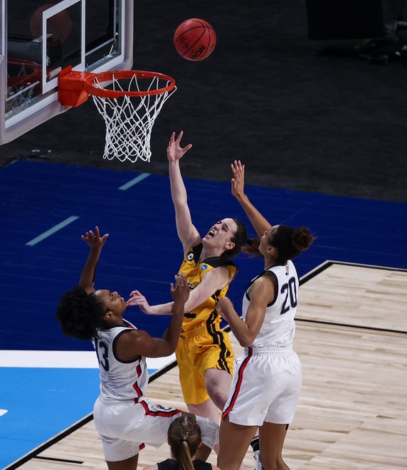 Iowa Hawkeyes guard Caitlin Clark (22) shoots the ball during the first quarter against the UConn Huskies in the Sweet 16 of the 2021 Women's NCAA Tournament, March 27, 2021, at Alamodome.