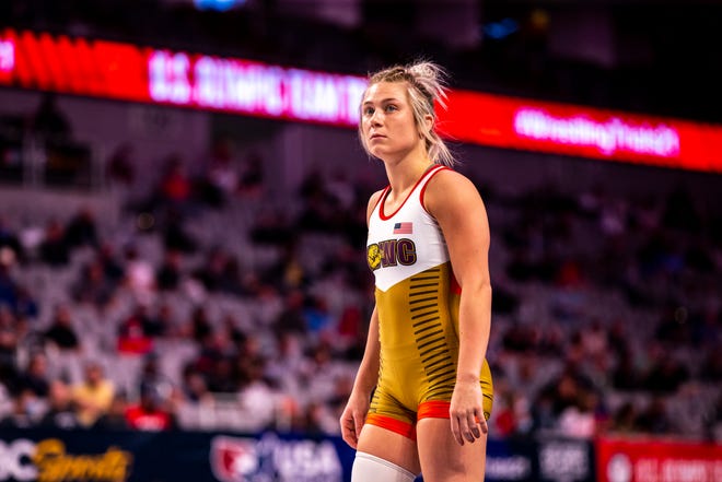 Felicity Taylor gets ready before a match at 53 kg during the first session of the USA Wrestling Olympic Trials, Friday, April 2, 2021, at Dickies Arena in Fort Worth, Texas.