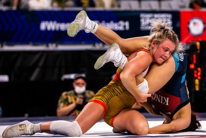 Felicity Taylor, left, wrestles Melanie Mendoza at 53 kg during the first session of the USA Wrestling Olympic Trials, Friday, April 2, 2021, at Dickies Arena in Fort Worth, Texas.