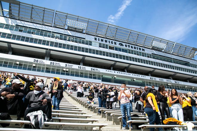 Iowa fans cheer during a NCAA Big Ten Conference football spring practice, Saturday, April 17, 2021, at Kinnick Stadium in Iowa City, Iowa.