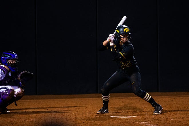 Iowa's Grace Banes (23) bats during a NCAA Big Ten Conference softball game against Northwestern, Saturday, April 17, 2021, at Bob Pearl Field in Iowa City, Iowa.