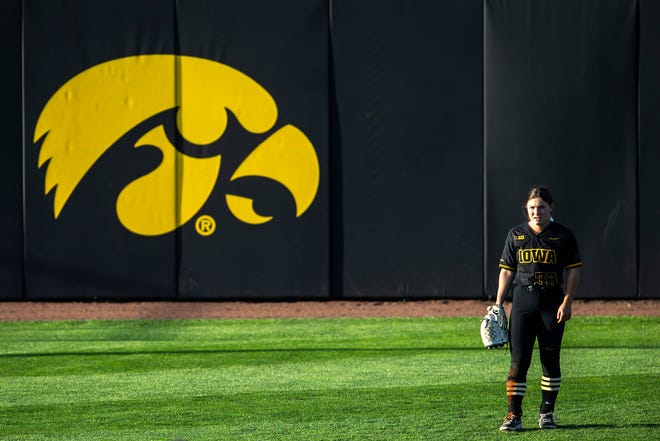 Iowa's Riley Sheehy (33) stands in left field during a NCAA Big Ten Conference softball game against Northwestern, Saturday, April 17, 2021, at Bob Pearl Field in Iowa City, Iowa.