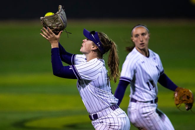 Northwestern's Morgan Newport gets an out during a NCAA Big Ten Conference softball game against Iowa, Saturday, April 17, 2021, at Bob Pearl Field in Iowa City, Iowa.