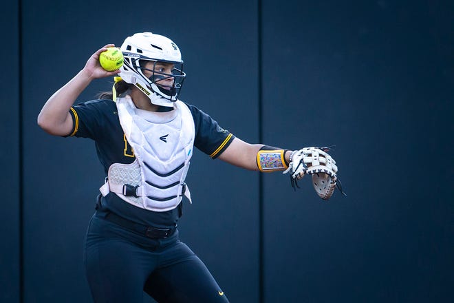 Iowa catcher Marissa Peek reacts after catching a strikeout during a NCAA Big Ten Conference softball game against Northwestern, Saturday, April 17, 2021, at Bob Pearl Field in Iowa City, Iowa.
