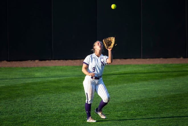 Northwestern's Angela Zedak (9) gets an out during a NCAA Big Ten Conference softball game against Iowa, Saturday, April 17, 2021, at Bob Pearl Field in Iowa City, Iowa.