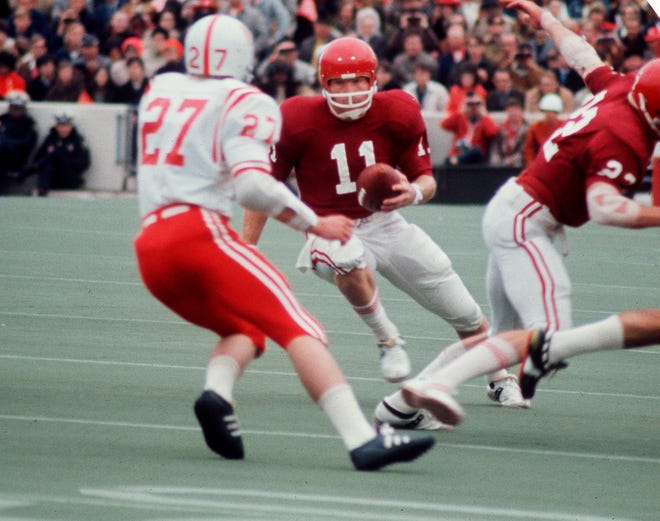 OU quarterback Jack Mildren makes a move against Nebraska during the "Game of the Century" in Norman on Nov. 25, 1971. The Cornhuskers beat the Sooners 35-31.