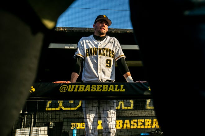 Iowa's Ben Norman (9) talks with reporters after a NCAA Big Ten Conference baseball game against Northwestern, Monday, April 26, 2021, at Duane Banks Field in Iowa City, Iowa.