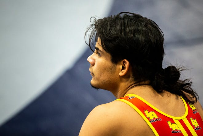 Robert Avila Jr., looks up from the mat while wrestling at 72 kg during the UWW Junior and Senior national Greco-Roman wrestling championships, Friday, April 30, 2021, at the GreenState Family Fieldhouse in Coralville, Iowa.