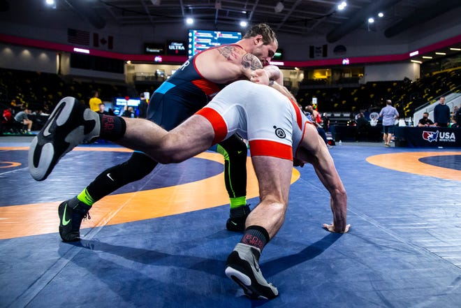Ben Provisor, left, wrestles John Hagey at 82 kg during the UWW Senior national Greco-Roman wrestling championships, Friday, April 30, 2021, at the Xtream Arena in Coralville, Iowa.