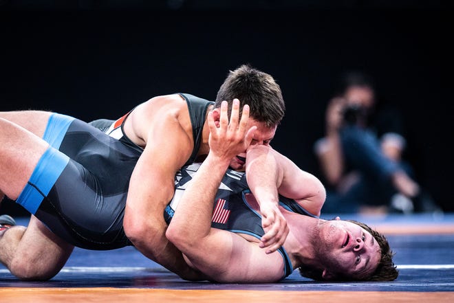 Kodiak Stephens, top, wrestles Tyler Hannah at 87 kg during the UWW Junior national Greco-Roman wrestling championships, Friday, April 30, 2021, at the Xtream Arena in Coralville, Iowa.