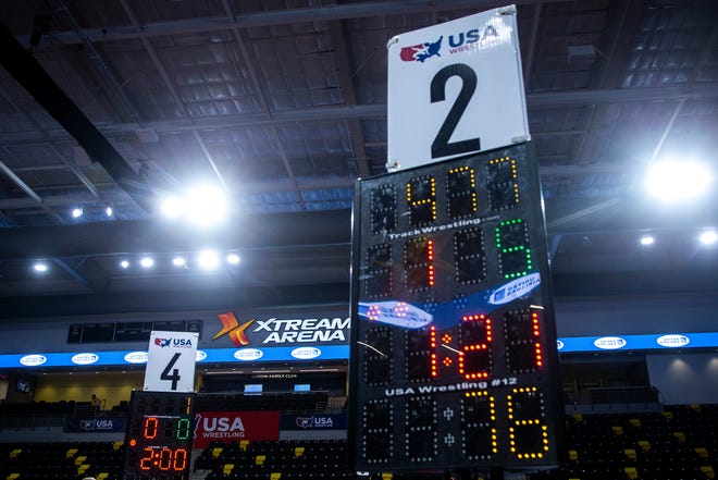 Score clocks are seen during the UWW Junior and Senior national Greco-Roman wrestling championships, Friday, April 30, 2021, at the Xtream Arena in Coralville, Iowa.