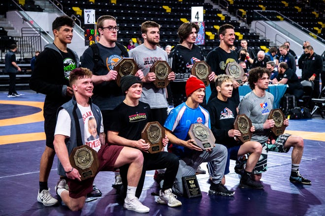 Members of the UWW Junior national Greco-Roman wrestling championship team pose for a photo, Friday, April 30, 2021, at the Xtream Arena in Coralville, Iowa.