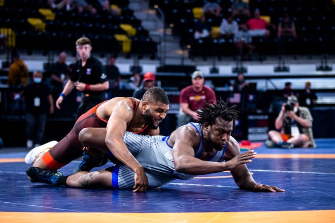 Nate Jackson, left, wrestles Kyven Gadson at 92 kg during the UWW Senior National freestyle wrestling championships, Saturday, May 1, 2021, at the Xtream Arena in Coralville, Iowa.